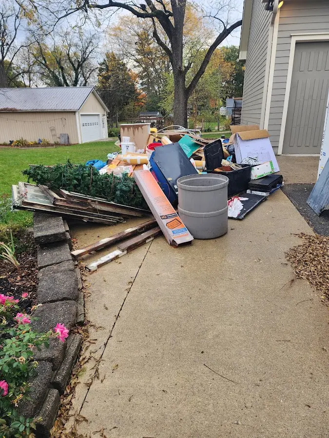 Dumpster being loaded with debris for 3 Yard Dumpster Rental in Elizabethtown